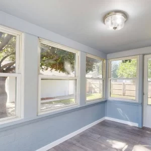 Bright sunroom with large windows