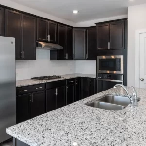 Updated kitchen interior in a suburban home with modern finishes